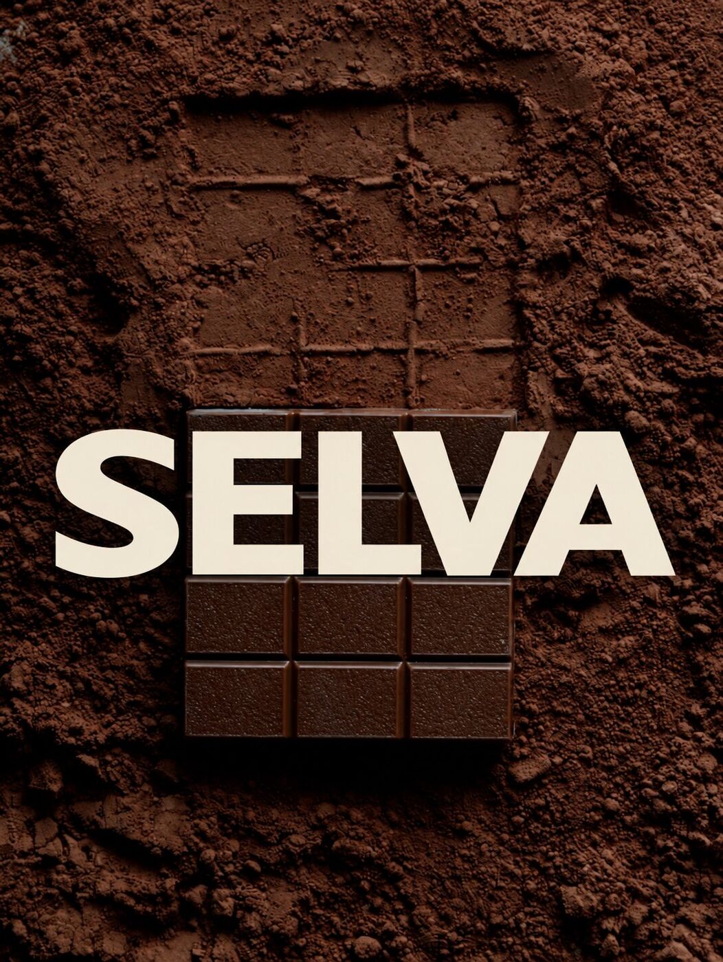 Selva logo over chocolate in cocoa powder