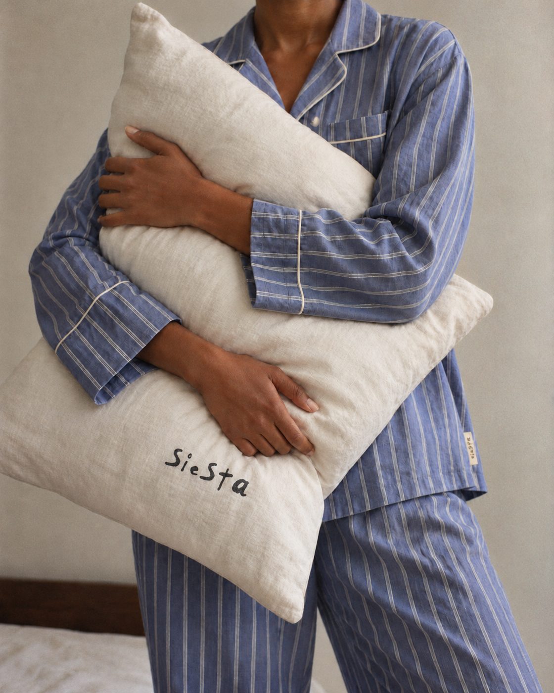 Striped linen pyjamas and a Siesta pillow